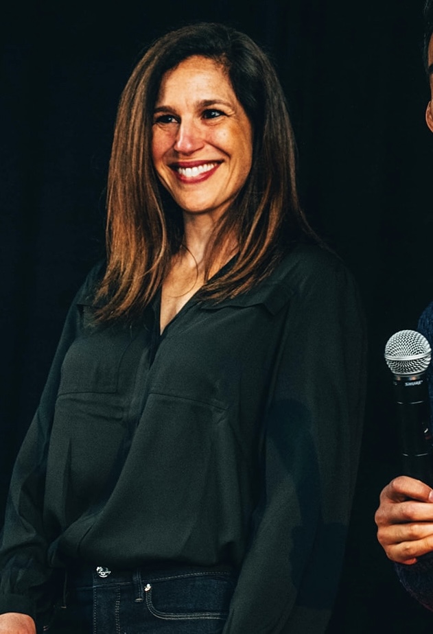 Adi Campuzano at a business event